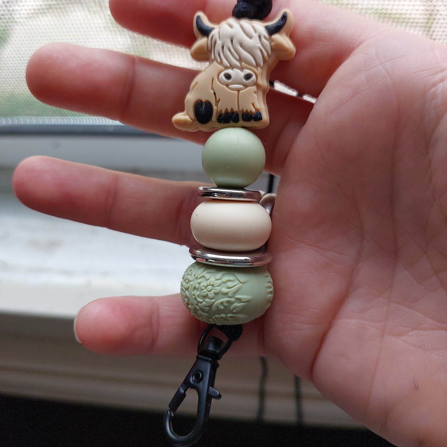 Sage green and highland cow, lanyard.
