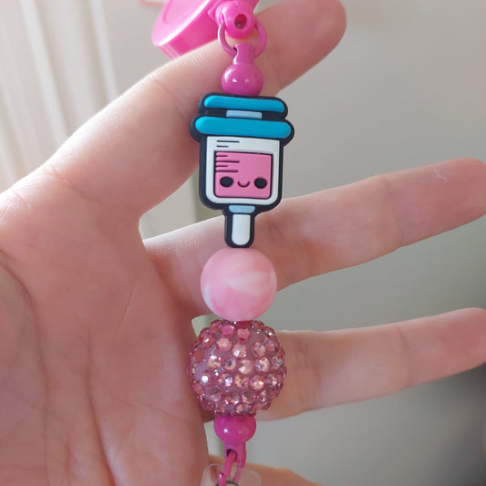 Pink Badge reel