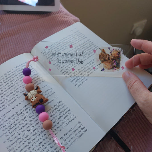 Thin acrylic bookmark with small silicone beads.