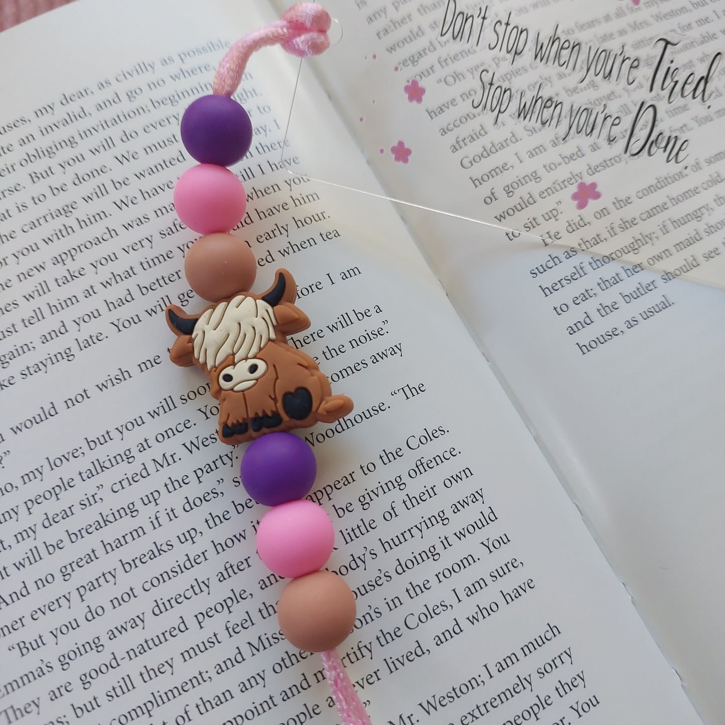 Thin acrylic bookmark with small silicone beads.