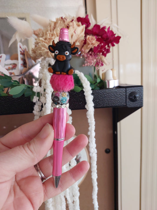 Pink Pen with a Highland Cow.